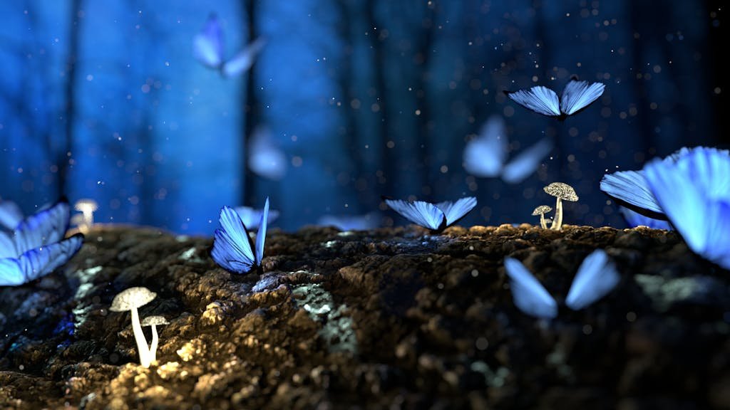 Close-up Photo of Glowing Blue Butterflies